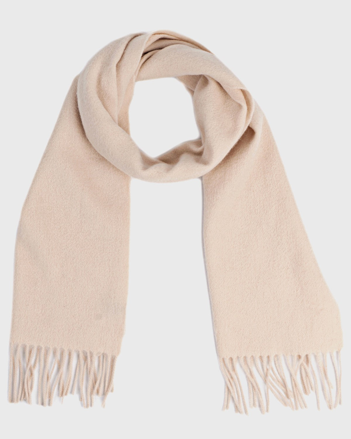 A beige wool winter scarf with fringes, perfect for adding warmth and style during the colder months.