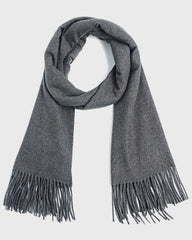 A cozy grey winter scarf featuring stylish fringes, perfect for keeping warm during the colder months.