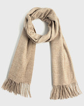 A cozy khaki winter scarf featuring stylish fringes, perfect for keeping warm during the colder months.