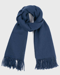 A luxurious navy blue wool scarf elegantly draped, showcasing its soft texture and refined style.