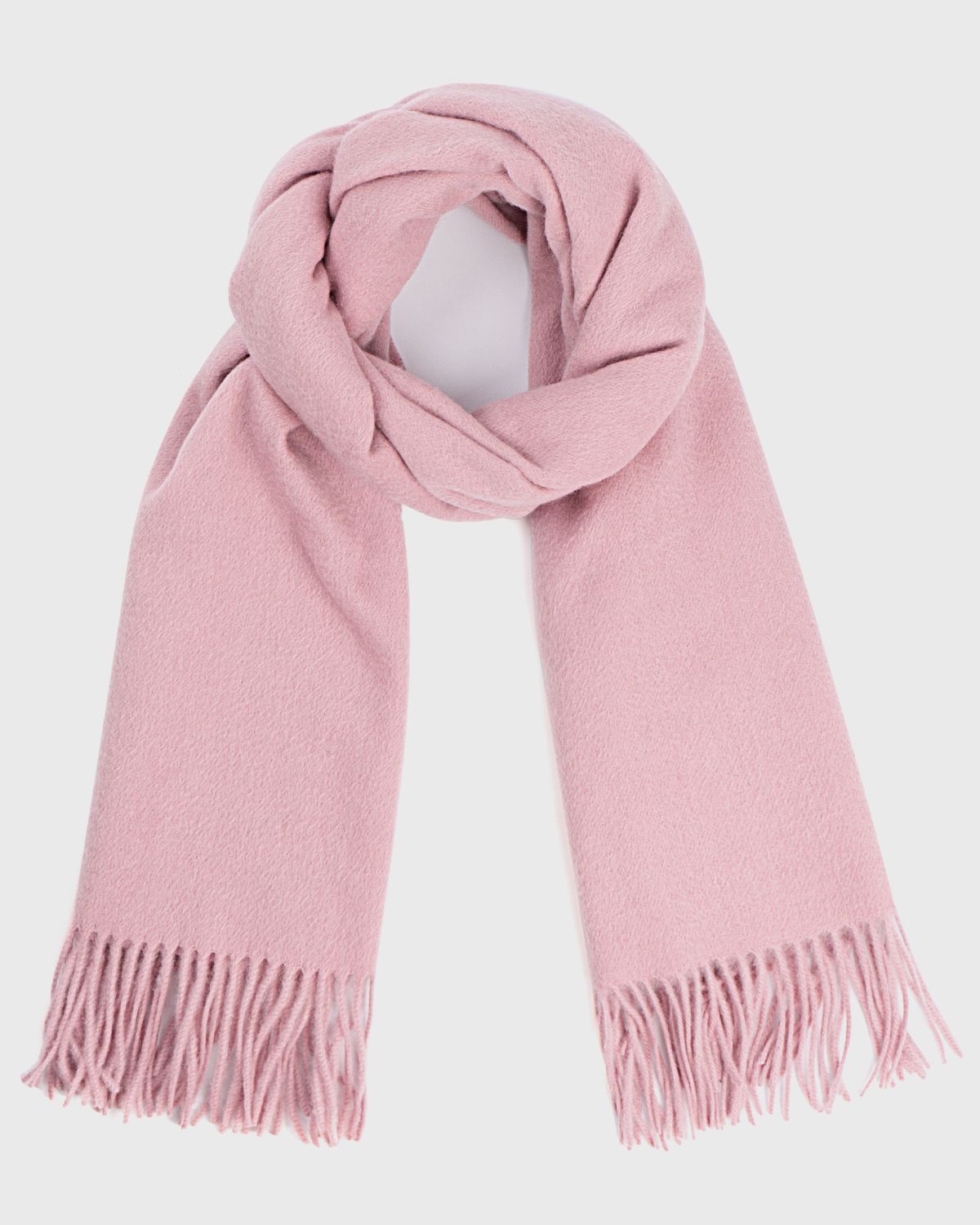 A pink scarf with fringes, elegantly draped, showcasing its soft texture and vibrant color.
